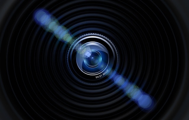 Camera lens represents strong web image